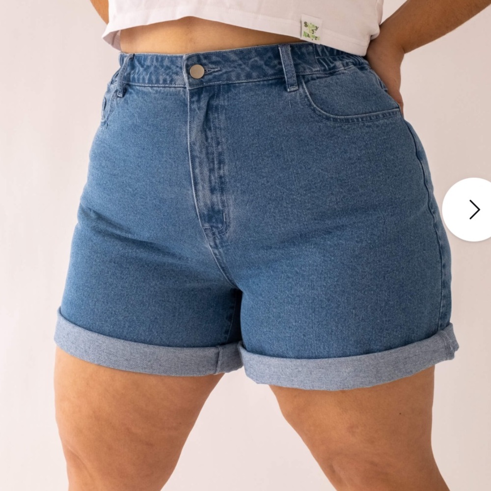 Shiny by Nature Denim shorts with stretchy sides.